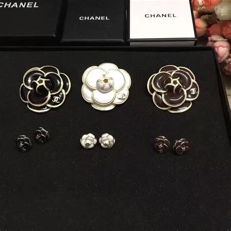 chanel camellia brooch stars|Chanel camellia flower earrings.